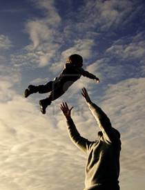 Description: silhouettes of father and son playing on sky background Stock Photo - 7771726